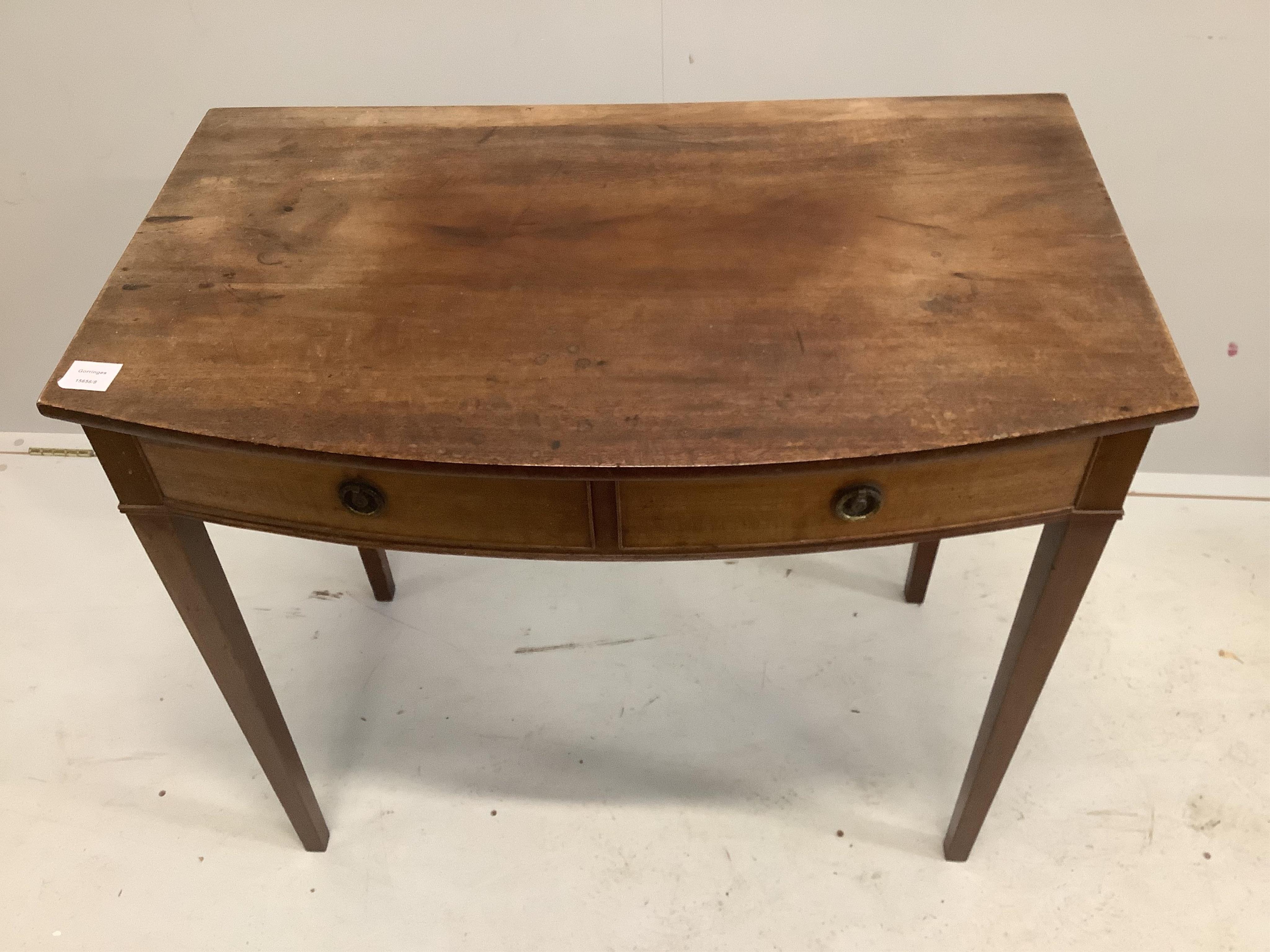 A Regency mahogany bowfront side table, width 86cm, depth 51cm, height 78cm. Condition - fair